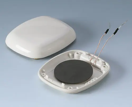 Partie inférieure avec piles rechargeables avec bobine permettant un chargement (exemple) 