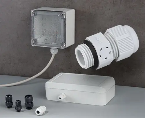 Passe-câbles à vis avec compensation de pression intégrée